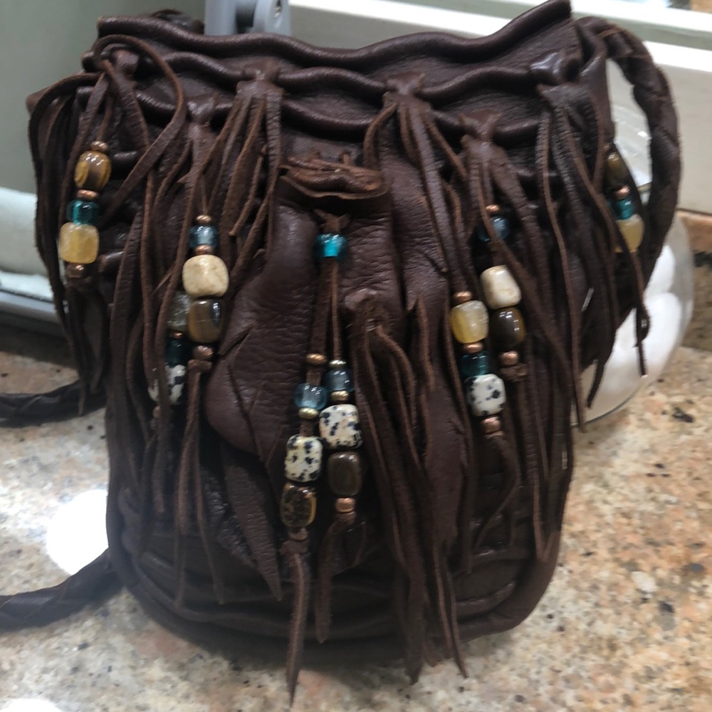 Beautiful brown BoHo Crossbody with detailed beading and braiding.